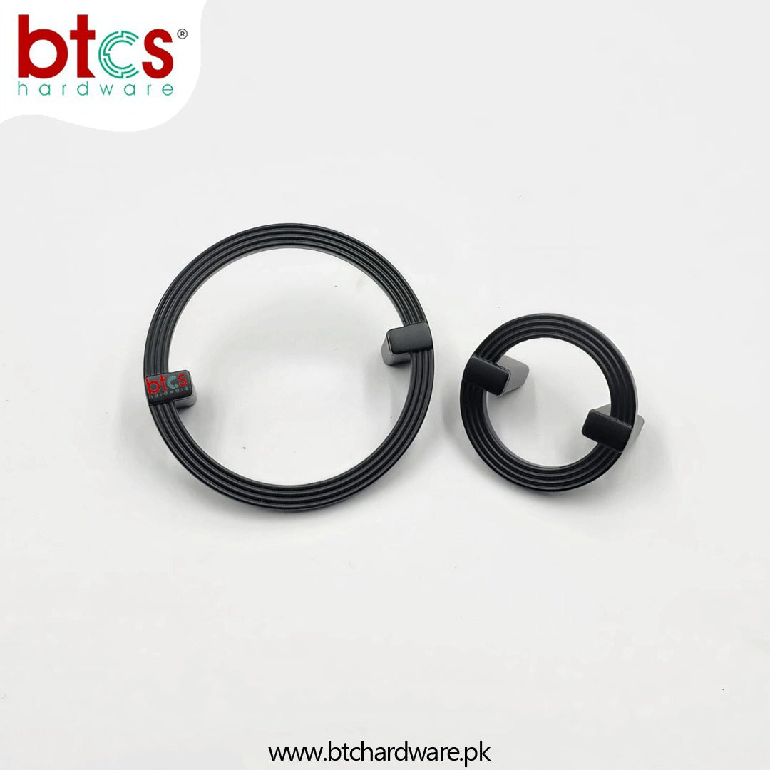 Two black metal washers 