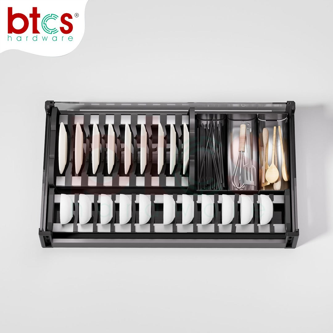 Dish rack with cutlery on a white background, featuring the btcs hardware logo.