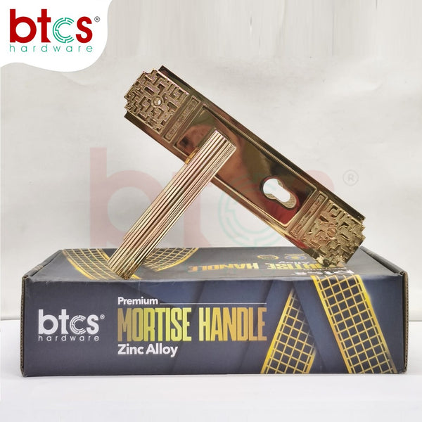 Gold mortise handle on a branded box with 'btcs hardware' logo.