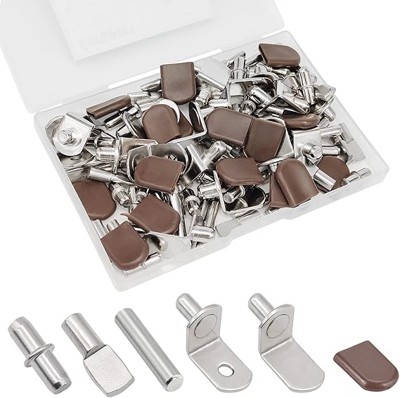 Set of metal and brown plastic components in a clear plastic case on a white background.