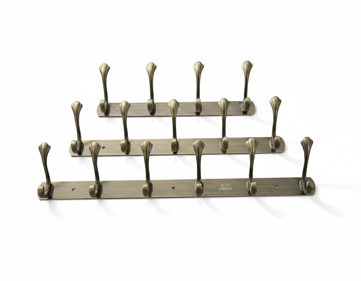 Wall-mounted coat rack with multiple hooks on a white background