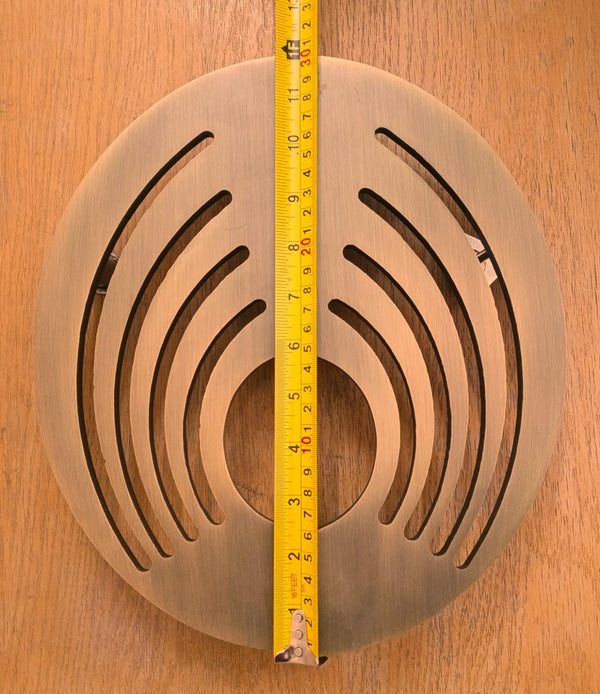 Wooden circular object with a measuring tape.